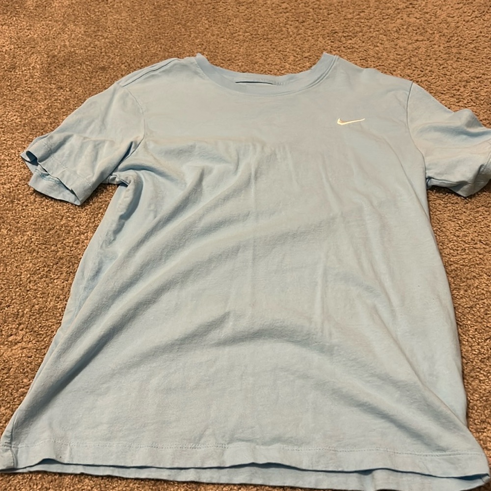Blue Nike athletic tee